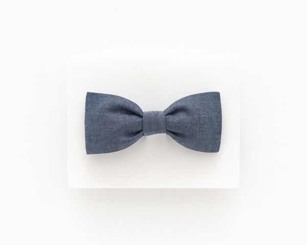 Dark blue polka dot bow tie